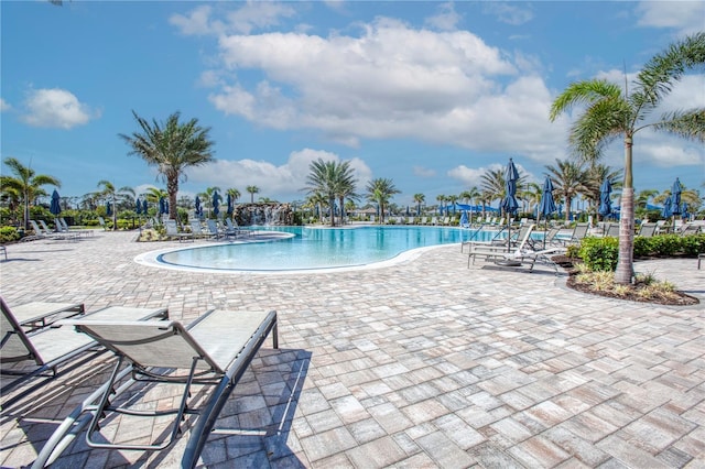 community pool featuring a patio area