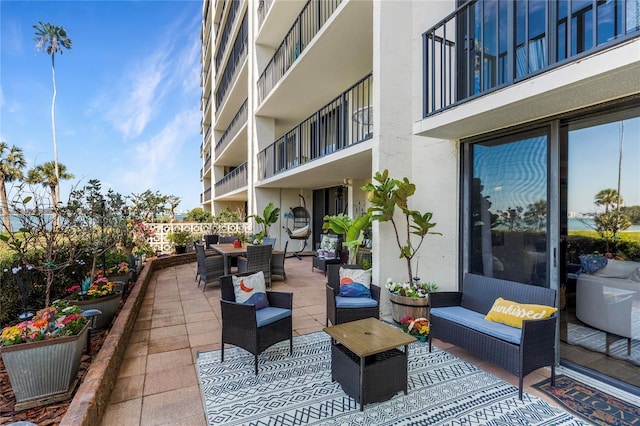 view of patio with outdoor dining area and an outdoor living space