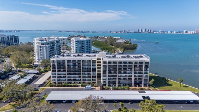 drone / aerial view with a water view and a city view