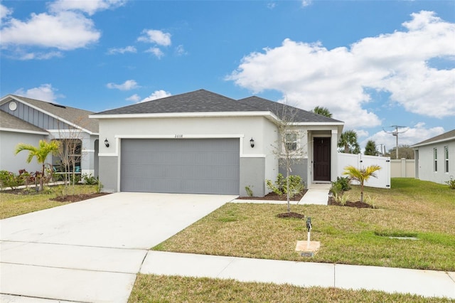 single story home featuring driveway, an attached garage, fence, a front lawn, and stucco siding