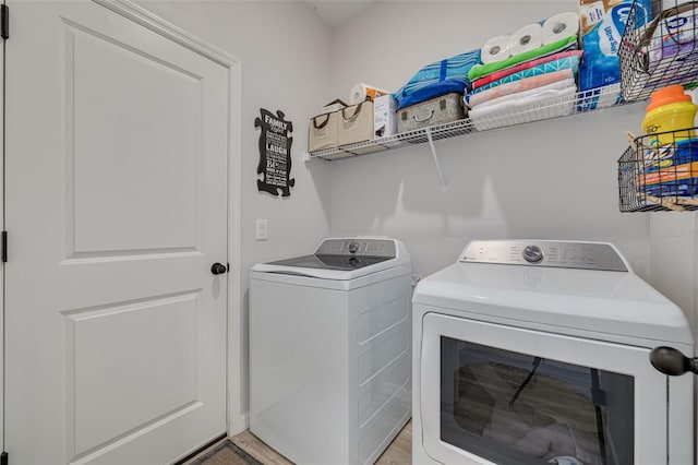 laundry area with laundry area and washing machine and dryer