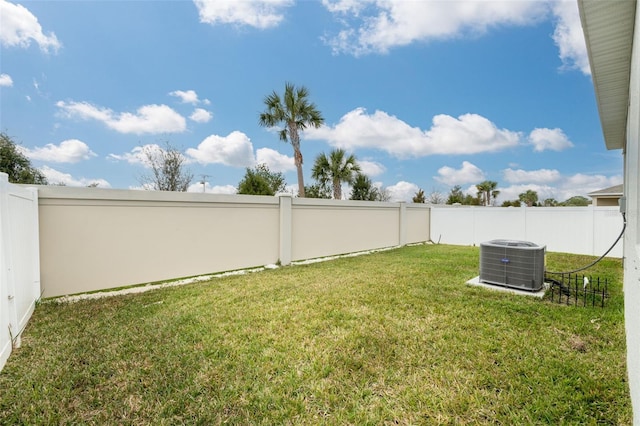 view of yard featuring cooling unit and a fenced backyard