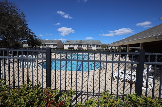 pool featuring fence