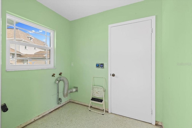 clothes washing area featuring laundry area