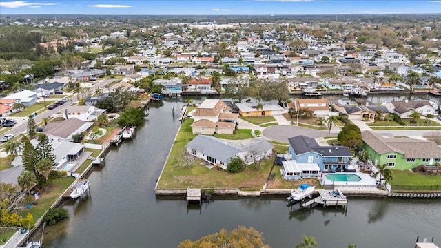 aerial view featuring a water view and a residential view