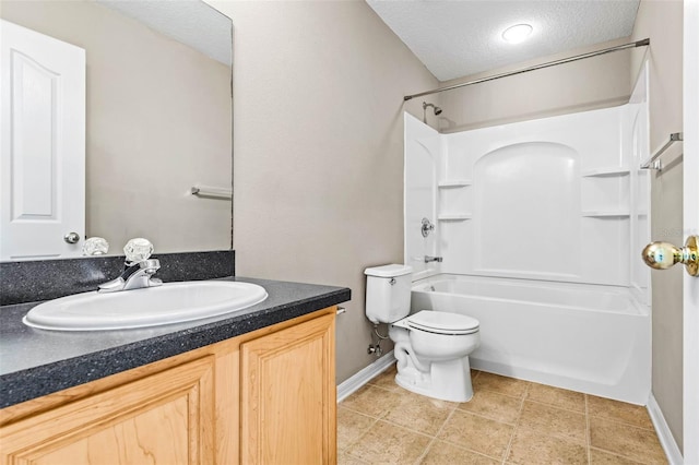 bathroom with a textured ceiling, shower / bathtub combination, toilet, vanity, and baseboards