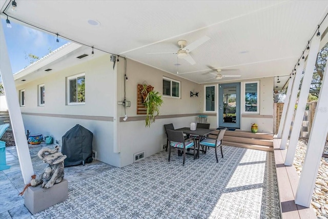 view of patio / terrace with visible vents, outdoor dining area, a grill, and a ceiling fan