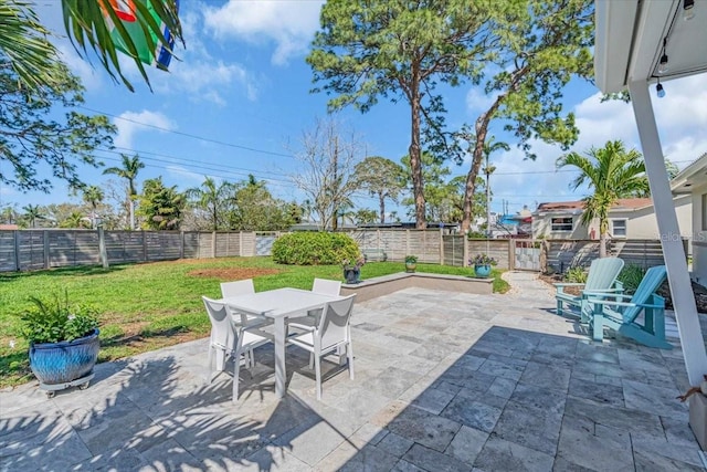 view of patio / terrace with outdoor dining area and a fenced backyard