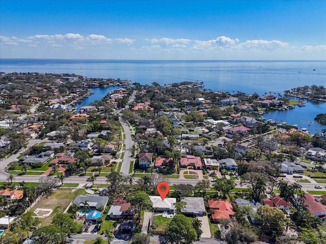 birds eye view of property with a residential view and a water view