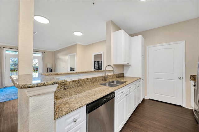 kitchen featuring white cabinetry, dishwasher, a peninsula, and a sink