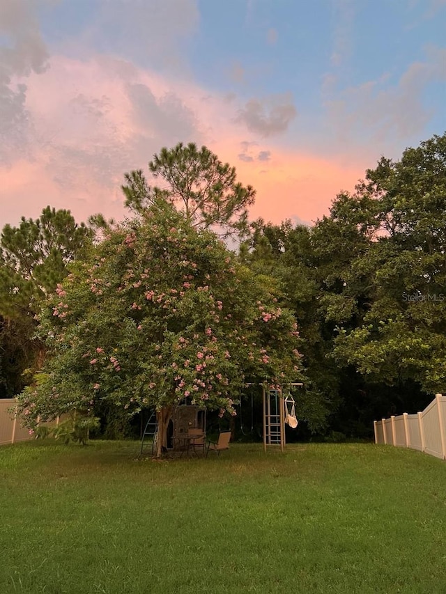 view of yard with fence