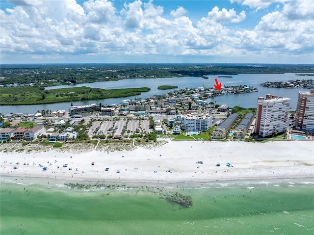 bird's eye view featuring a water view and a view of the beach