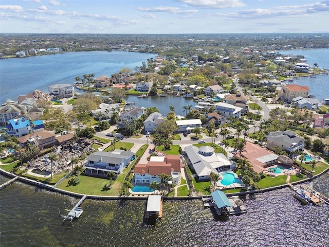 bird's eye view with a water view and a residential view