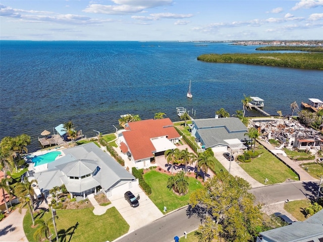 birds eye view of property featuring a water view