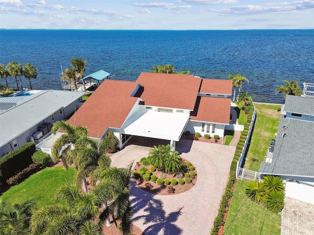 birds eye view of property featuring a water view