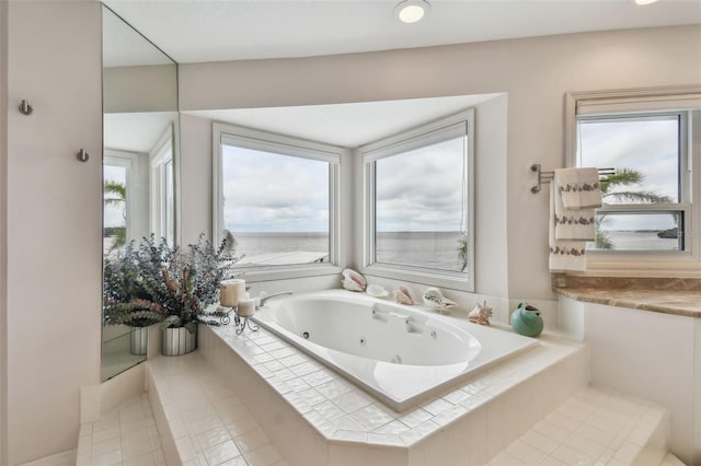 bathroom with a whirlpool tub