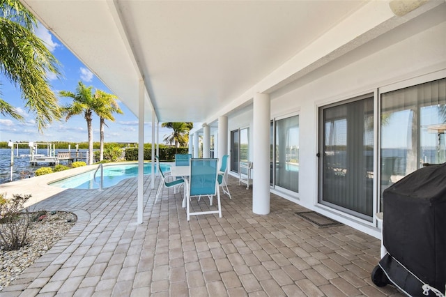 view of patio / terrace featuring an outdoor pool