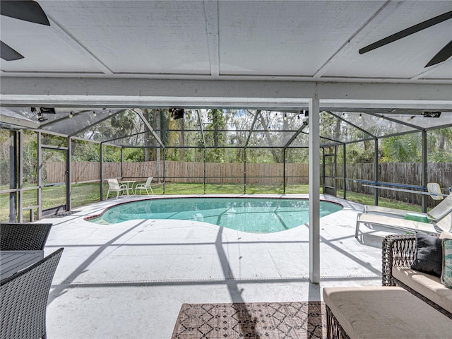 view of swimming pool with a fenced in pool, a fenced backyard, and a patio