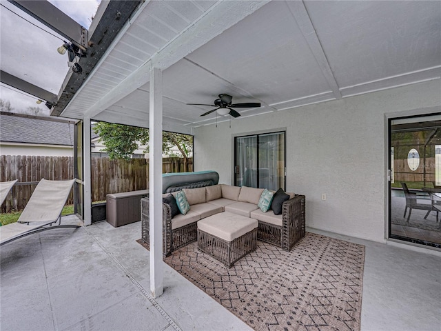 view of patio / terrace featuring ceiling fan, fence, and outdoor lounge area