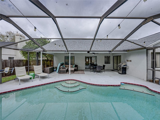 view of pool featuring area for grilling