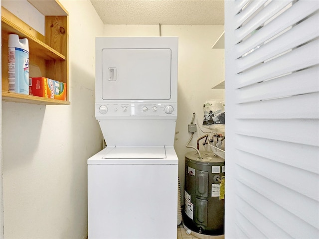 laundry room with stacked washer and clothes dryer, electric water heater, a textured ceiling, and laundry area