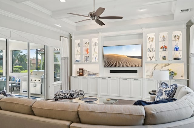 living room featuring visible vents, a raised ceiling, ceiling fan, ornamental molding, and recessed lighting