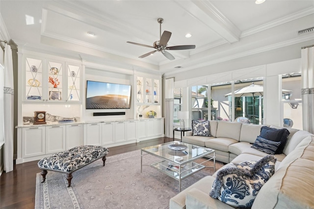 living room with dark wood-type flooring, ornamental molding, beamed ceiling, and visible vents