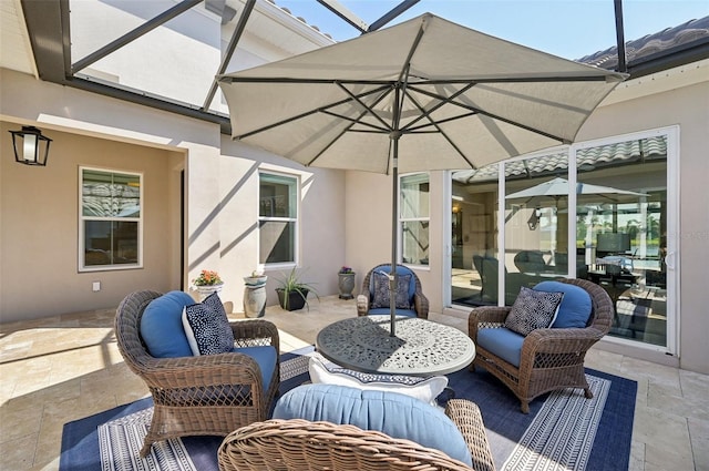 view of patio / terrace with a lanai