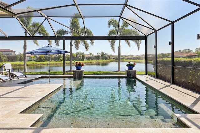 pool featuring a lanai, a water view, and a patio