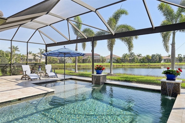 outdoor pool with a lanai, a patio area, and a water view