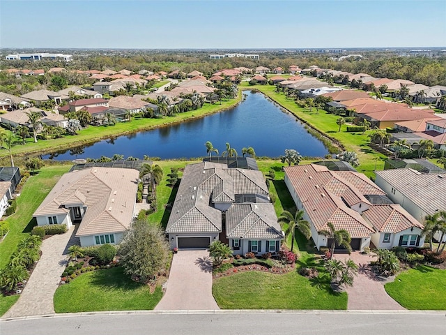 aerial view featuring a water view and a residential view