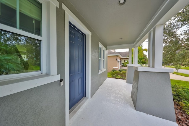 view of patio featuring a porch