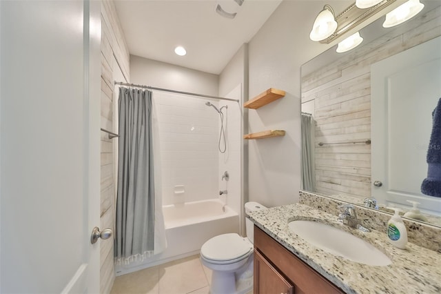 full bath featuring vanity, shower / bath combo, tile patterned flooring, and toilet