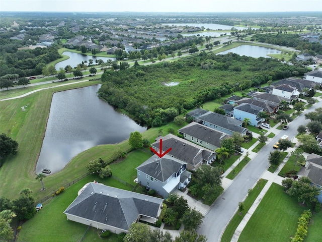 bird's eye view with a water view and a residential view