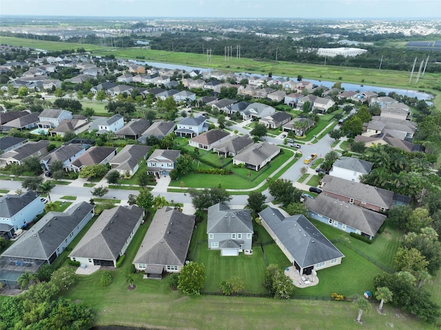 aerial view with a water view and a residential view