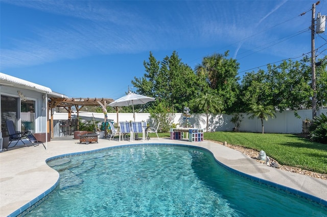 view of swimming pool with a fenced backyard, a fenced in pool, a fire pit, and a lawn