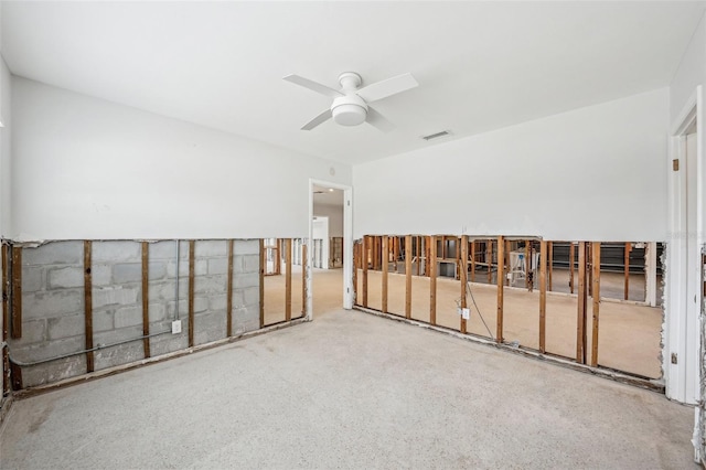 unfurnished room featuring a ceiling fan and visible vents