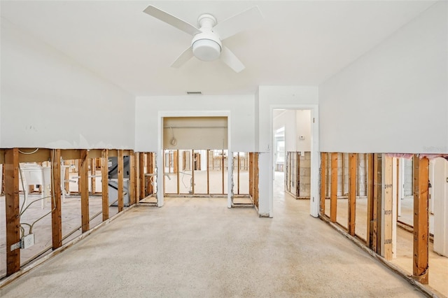 spare room with visible vents and a ceiling fan