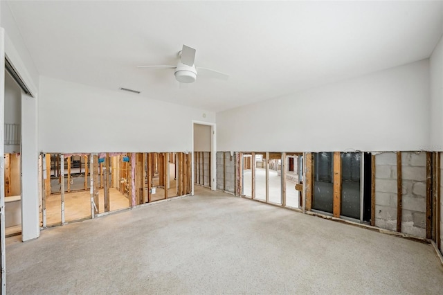 empty room featuring ceiling fan and visible vents