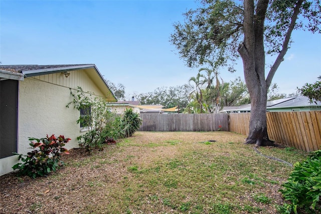 view of yard featuring a fenced backyard