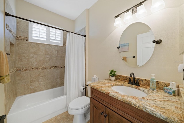 bathroom featuring toilet, shower / bath combination with curtain, vanity, and tile patterned flooring