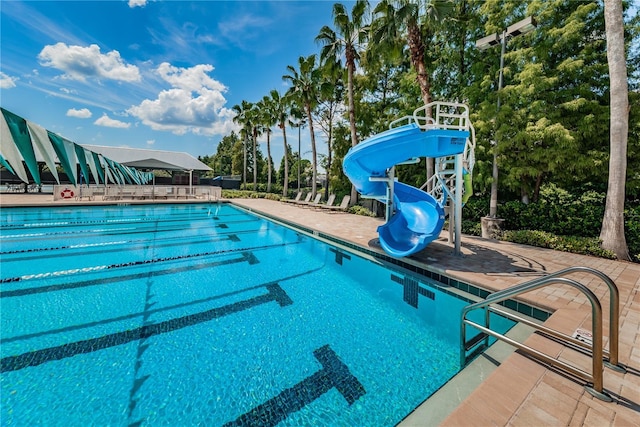 community pool with a water slide