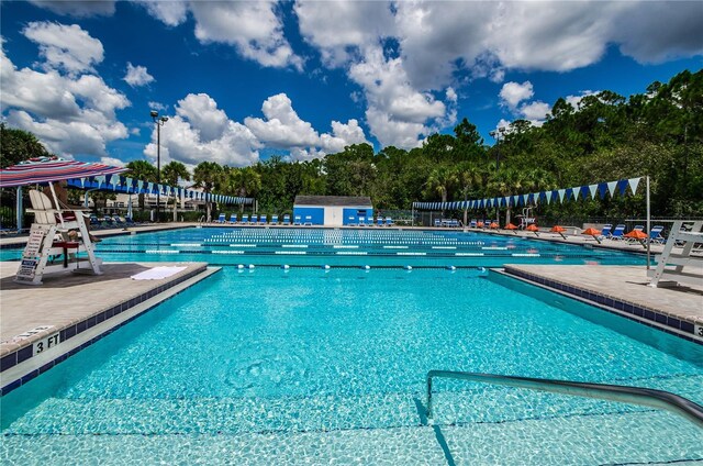 community pool featuring a patio area