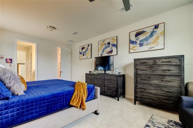 bedroom with light tile patterned flooring and visible vents