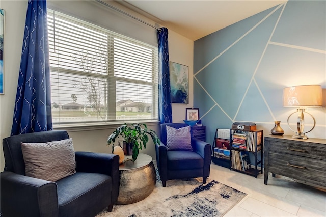 living area featuring tile patterned floors