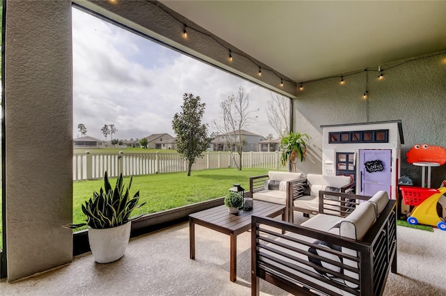 view of patio / terrace with an outdoor hangout area and fence