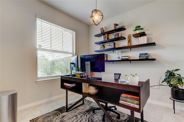 home office featuring baseboards and light tile patterned flooring