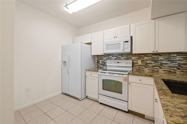 kitchen with white appliances, stone counters, white cabinetry, and tasteful backsplash