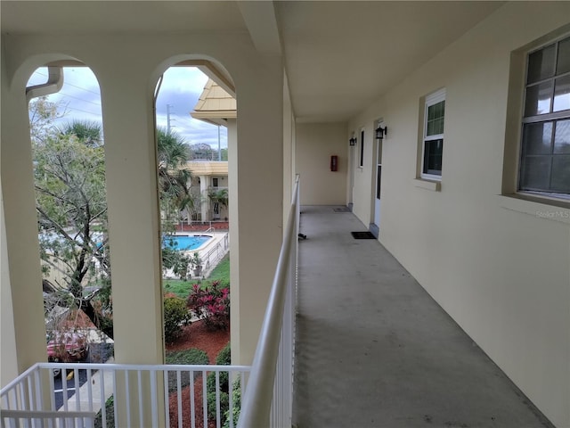 view of patio featuring a balcony