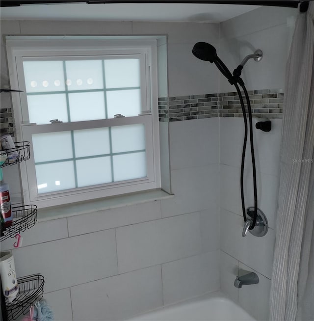 bathroom featuring bathing tub / shower combination